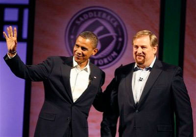 In this Aug. 16, 2008 file photo, then Democratic presidential candidate, Sen. Barack Obama, D-Ill., left, joins Pastor Rick Warren of Saddleback Church, for a discussion on moral issues. Aretha Franklin will sing, Warren will pray and more than 11,000 U.S. troops will be watching over the ceremonies in case of a terrorist attack during President-elect Barack Obama's Inauguration.