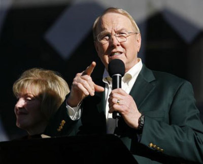 In this file photo, James Dobson, founder of Focus on the Family, speaks as his wife Shirley looks on during a 'Yes on 8' anti-gay marriage prayer event held at Qualcomm Stadium in San Diego on Nov. 1, 2008.