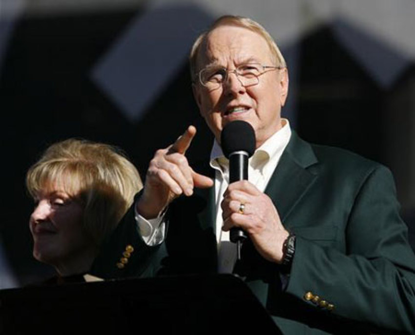 In this file photo, James Dobson, founder of Focus on the Family, speaks as his wife Shirley looks on during a "Yes on 8" anti-gay marriage prayer event held at Qualcomm Stadium in San Diego on Nov. 1, 2008.