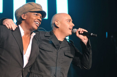 newsboys frontman Michael Tait (left)and former frontman Peter Furler appear on stage during a concert in Seattle on March 27, 2009.