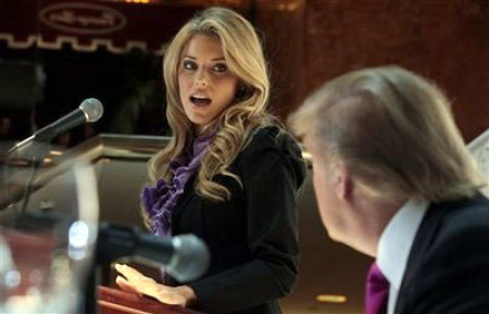 Miss California USA, Carrie Prejean, thanks Donald Trump for his support, during a news conference in New York, Tuesday, May 12, 2009. Trump, who owns the Miss USA pageant, says Prejean can retain her Miss California USA crown after she caused a stir expressing opposition to gay marriage and posing in risque photographs.