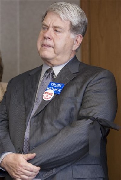 This June 2, 2009 file photo shows Dr. LeRoy Carhart wearing a black arm band during a news conference in his office in Bellevue, Neb. The Nebraska doctor said Wednesday that he will perform third-term abortions in Kansas after the slaying of abortion provider George Tiller, but declined to say whether his plans include opening a new facility or offering the procedure at an existing practice.