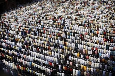 Thousands of Indian Muslims gather for the Eid al-Fitr prayer at the Jama Mosque in New Delhi, India, Monday, Sept. 21, 2009.