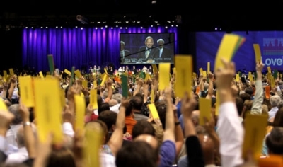 Southern Baptist Convention President Johnny M. Hunt, pastor of First Baptist Church of Woodstock, Ga., looks out over more than 10,000 messengers to the 2010 annual meeting of the Southern Baptist Convention at the Orange County Convention Center in Orlando, Fla. Messengers overwhelmingly voted to adopt the recommendations of the Great Commission Resurgence Task Force, a major emphasis of Hunt's presidency.