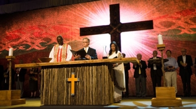 Lausanne leaders prepare attendees for communion during the closing ceremony of the Lausanne III conference on Sunday, Oct. 24, 2010, in Cape Town, South Africa.