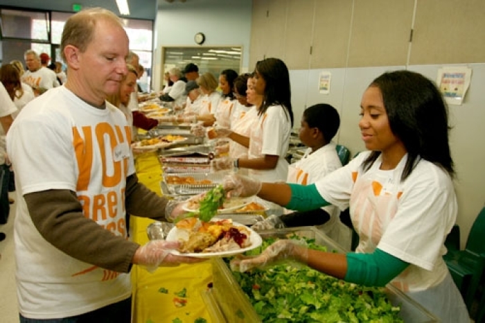 Union Rescue Mission volunteers serve Thanksgiving meals on Saturday, November 20, 2010 in Los Angeles, California.