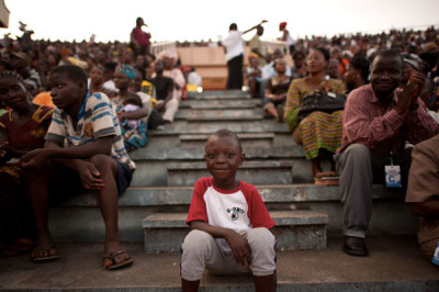 A young boy sits on the stadium stairs during the All Liberia Life Festival with Franklin Graham in Monrovia, Liberia, March 25-27, 2011.