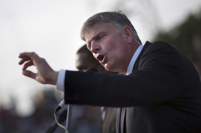 In this file photo, Franklin Graham, son of evangelist Billy Graham, addresses the crowd at the Festival of Hope, an evangelistic rally held at the national stadium in Port-au-Prince, January 9, 2011.