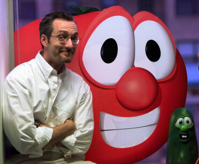 In this file photo taken on Dec. 18, 1998, Phil Vischer, co-creator of 'Veggie Tales,' is seen with main characters 'Bob' the tomato and ' Larry' the cucumber in Chicago.