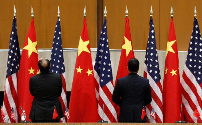 Chinese and U.S. flags are arranged during the third annual U.S.-China Strategic and Economic Dialogue (S&ED) at the State Department in Washington May 9, 2011.