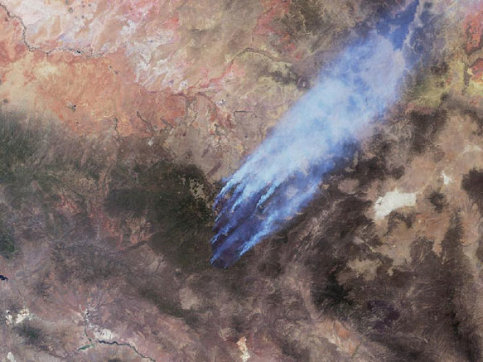 NASA's MISR (multi-angle imaging spectroRadiometer) took this image on the Wallow and Horseshoe 2 fires in Arizona. The fire has burned approximately 400,000 acres of land to which more than 2,000 people are working to contain the fire.