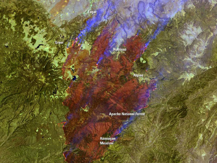 The Landsat 7 image shows the burning mountains of easter Arizona close to the border with New Mexico. It is said to be the second largest wildfire in the state's history.