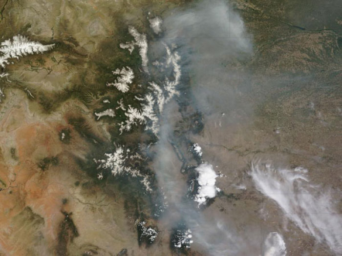 A satellite view taken from NASA's Terra satellite shows the conflagration located in the Apache-Sitgreaves National Forest in east-central Arizona. So far the fire has scorched over 600 square miles of land.