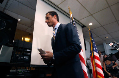 Former U.S. Rep. Anthony Weiner (D-NY) departs after announcing his resignation from the United States House of Representatives during a news conference in Brooklyn, New York, June 16, 2011. Weiner resigned on Thursday over a weeks-long Internet sex scandal, succumbing to bipartisan calls for him to step down.