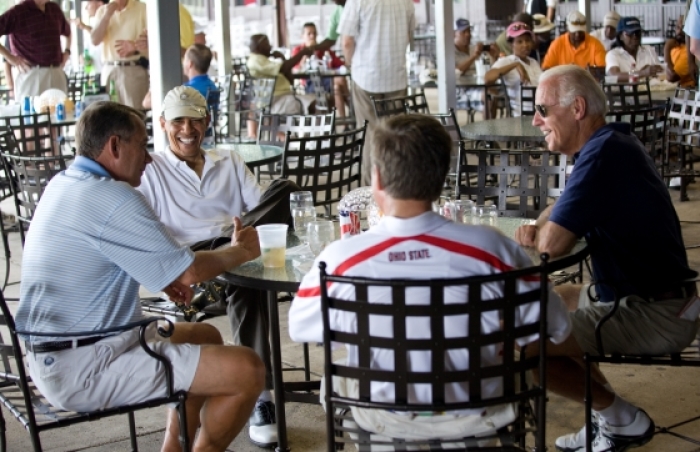 After playing a round of golf, President Barack Obama has a drink with Vice President Joe Biden, Speaker of the House John Boehner, and Ohio Gov. John Kasich, at Joint Base Andrews, June 18, 2011.