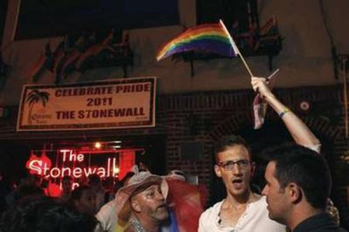 People celebrate outside of the Stonewall Inn while as the New York Senate voted on a bill legalizing gay marriage in New York June 24, 2011.