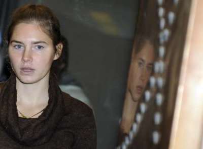 American university student Amanda Knox arrives in the courtroom during a murder trial session in Perugia December 2, 2009.