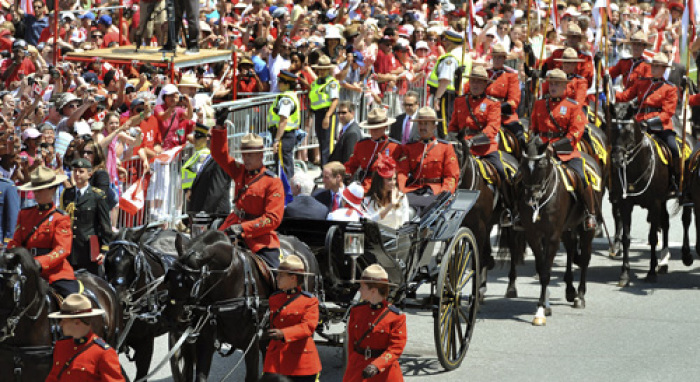 Britain's Prince William and his wife Catherine, the Duchess of Cambridge, arrive in a Landau as part of Canada Day celebrations in Ottawa July 1, 2011. Prince William and his wife Catherine, Duchess of Cambridge, are on a royal tour of Canada from June 30 to July 8.