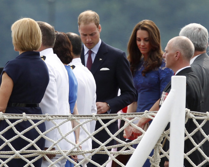 Britain's Prince William and his wife Catherine, Duchess of Cambridge, arrive at a prayer service on board the HMCS Montreal in Quebec City July 3, 2011. Prince William and his wife are on a royal tour from June 30 to July 8.