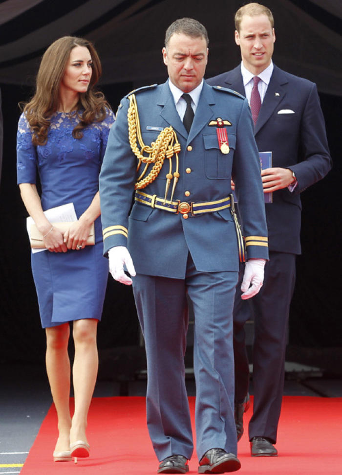 Britain's Prince William and his wife Catherine, Duchess of Cambridge, arrive at a prayer service on board the HMCS Montreal in Quebec City July 3, 2011. Prince William and his wife Catherine are on a royal tour from June 30 to July 8.