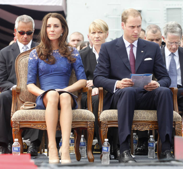 Britain's Prince William and his wife Catherine, Duchess of Cambridge, take part in a prayer service on board the HMCS Montreal in Quebec City July 3, 2011. Prince William and his wife Catherine are on a royal tour from June 30 to July 8.