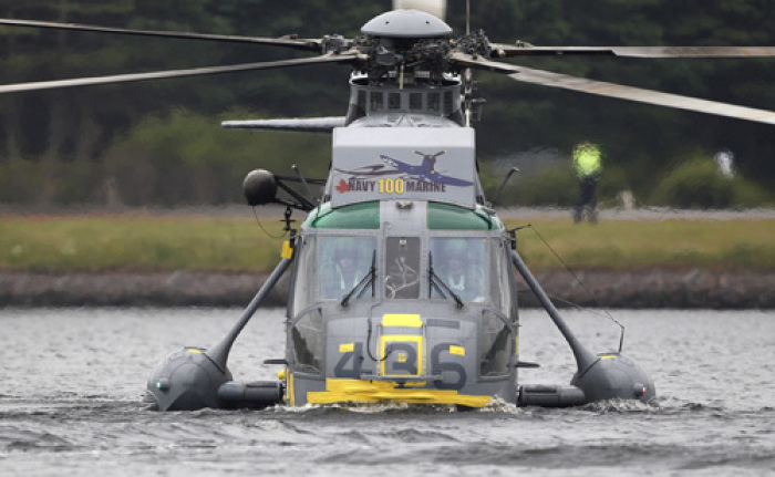 A Canadian forces Sea King helicopter flown by Britain's Prince William lands on Dalvay lake in a routine called 'waterbirding' in Dalvay-by-the-sea July 4, 2011.