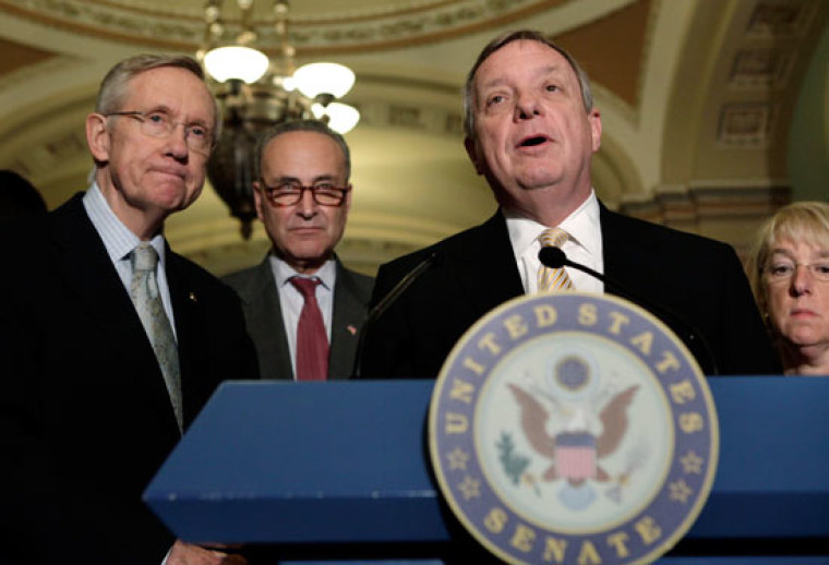 Sen. Dick Durbin (D-IL) speaks to the media on budget talks, alongside (L-R) Senate Majority Leader Harry Reid (D-NV), Sen. Charles Schumer (D-NY) and Sen. Patty Murray (D-WA), on Capitol Hill in Washington June 23, 2011.