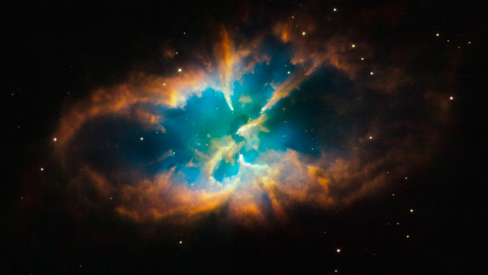 If the Sun dies, it will blow off its outer layers of gas and turn into a white dwarf. The Hubble Space Telescope has taken this unprecedented picture of what planetary nebulae look like. This is the NGC 2818.