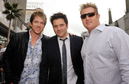 Rascal Flatts band members Joe Don Rooney (L), Jay DeMarcus (C) and Gary LeVox (R) attend the premiere of "Hannah Montana the Movie" in Los Angeles April 2, 2009.