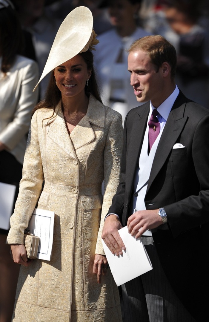 Catherine, Duchess of Cambridge, and Prince William leave after the marriage of Britain's Zara Phillips, the eldest granddaughter of Queen Elizabeth, and England rugby captain Mike Tindall, at Canongate Kirk in Edinburgh, Scotland July 30, 2011.