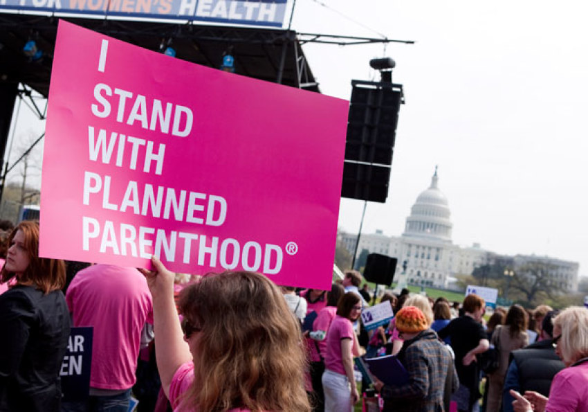 Members of Planned Parenthood, NARAL Pro-Choice America and more than 20 other organizations hold a 