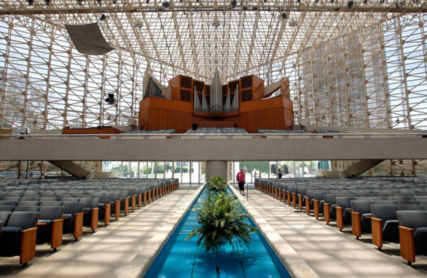 A view of the interior of the Crystal Cathedral in Garden Grove, Calif. The bankruptcy sale of Crystal Cathedral, the glass-walled Orange County church known for its "Hour of Power" broadcasts, has touched off a bidding war between a Roman Catholic diocese and a local university. This, after church administrators announced that the campus is not for sale and launched a pledge drive to keep the cathedral. But that is a show of opposition that could put it on a legal collision course with creditors.