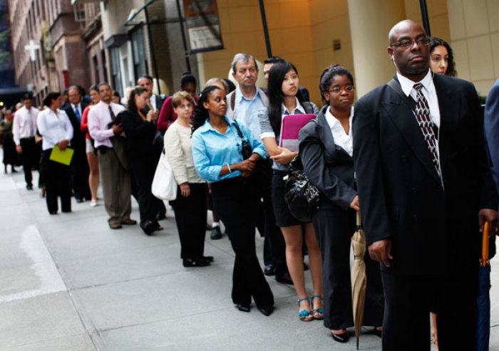People wait in line to enter a job fair in New York August 15, 2011. U.S. President Barack Obama began a bus tour of the U.S. Midwest focused on jobs and the economy on Monday, aiming to leave behind doubts about his leadership that could dent his 2012 re-election prospects.