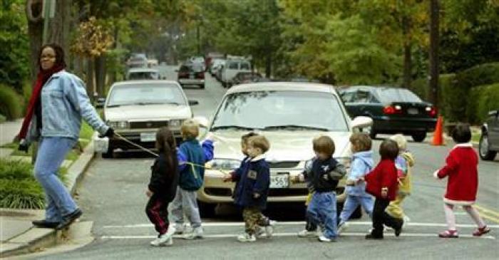 Washington D.C. preschoolers at Cleveland Park Congregational Church enjoy a walk outside, October 25, 2002.