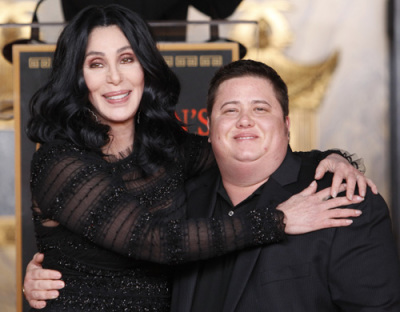 Cher poses with Chaz Bono during her hand and footprint ceremony in the forecourt of the Grauman's Chinese Theatre in Hollywood, California November 18, 2010.