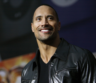 Dwayne Johnson poses at the premiere of the movie 'Race to Witch Mountain' at El Capitan theatre in Hollywood, California March 11, 2009.