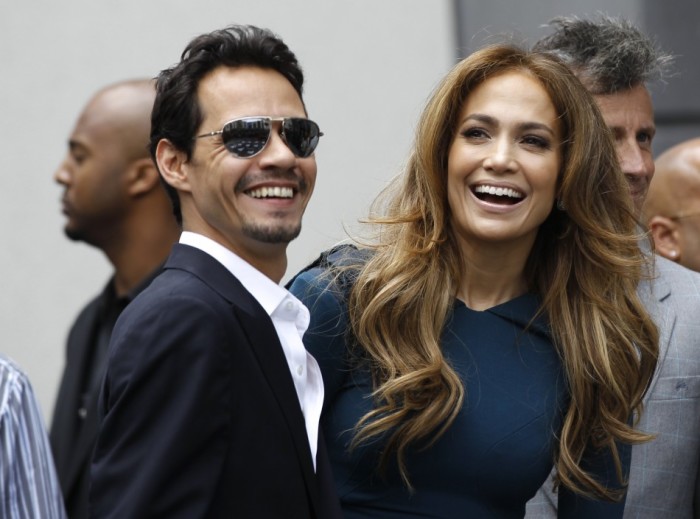 Actress Jennifer Lopez and her husband Marc Anthony attend the ceremony where producer Simon Fuller was honored with a star on the Walk of Fame.