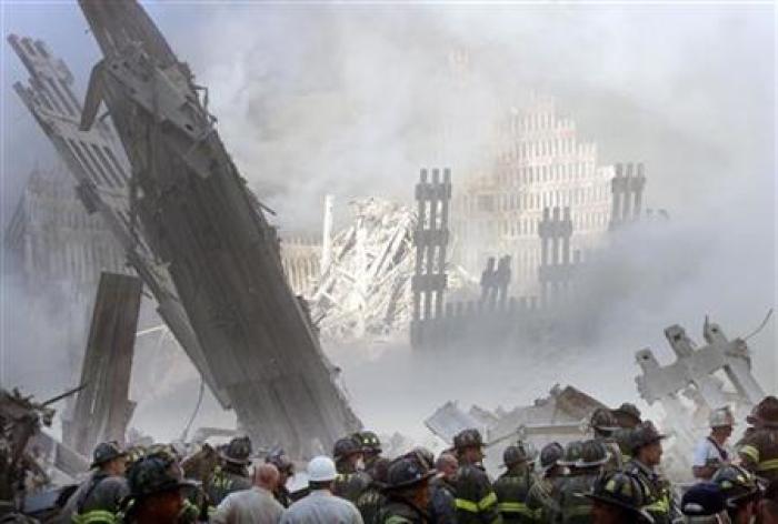 Firefighters at the destroyed World Trade Center, September 11, 2001.