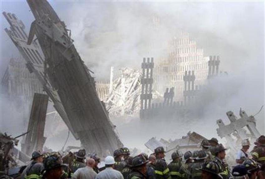 Firefighters at the destroyed World Trade Center, September 11, 2001.