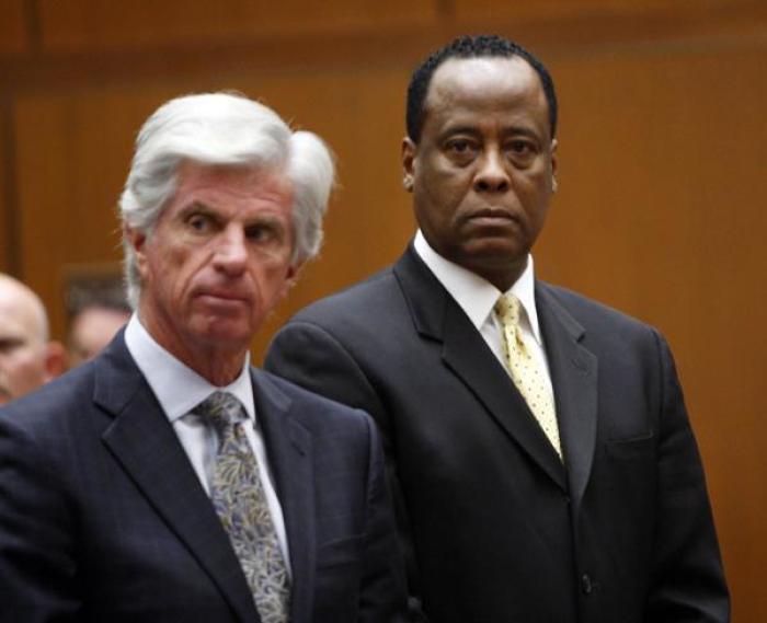 Dr Conrad Murray (right) with his attorney J. Michael Flanagan during today's hearing at a Criminal Court in Los Angeles.