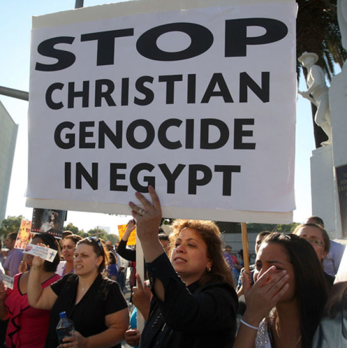 Coptic Christians protest against the killings of people during clashes in Cairo between Christian protesters and military police, and what the demonstrators say is persecution of Christians, in Los Angeles, California October 16, 2011. The demonstrators are rallying for Barack Obama's administration to intervene.
