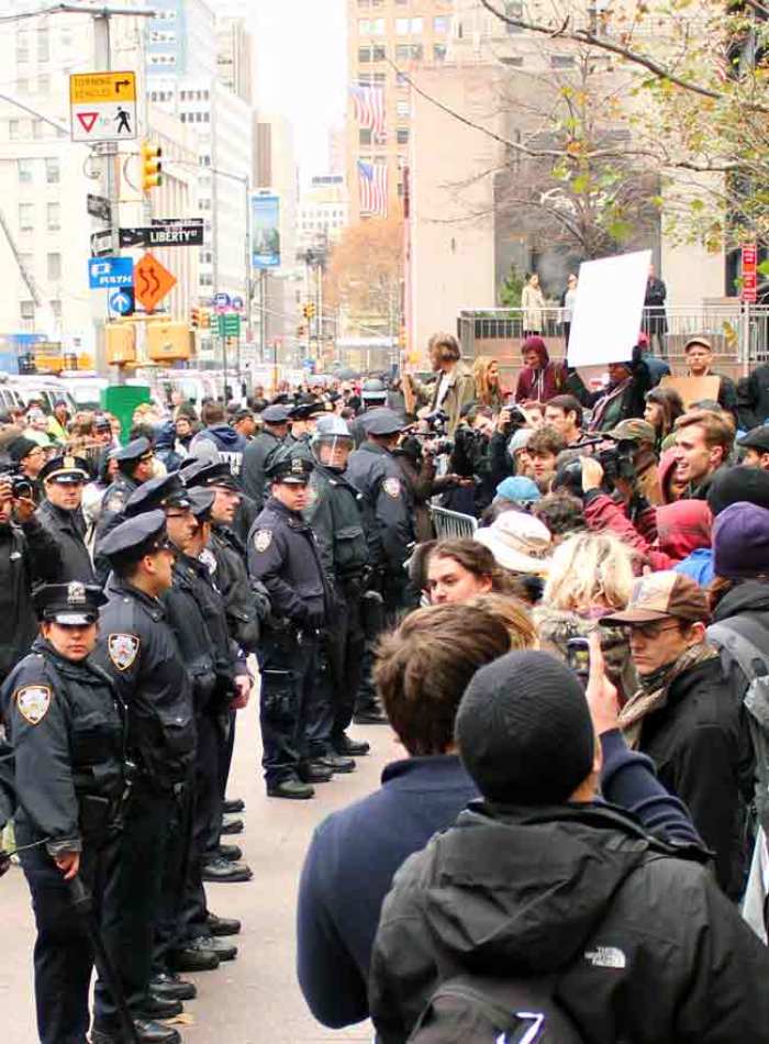New York City police officers line up to barricade 'Occupy Wall Street' protesters inside Zuccotti Park on Nov. 17, 2011.