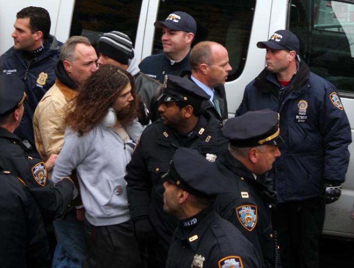 An 'Occupy Wall Street' protester is arrested outside Zuccotti Park in New York City on Nov. 17, 2011