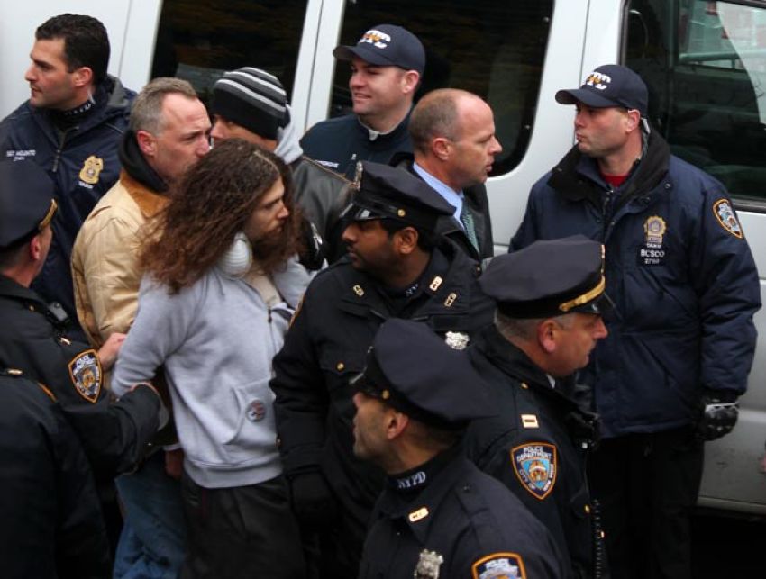 An "Occupy Wall Street" protester is arrested outside Zuccotti Park in New York City on Nov. 17, 2011