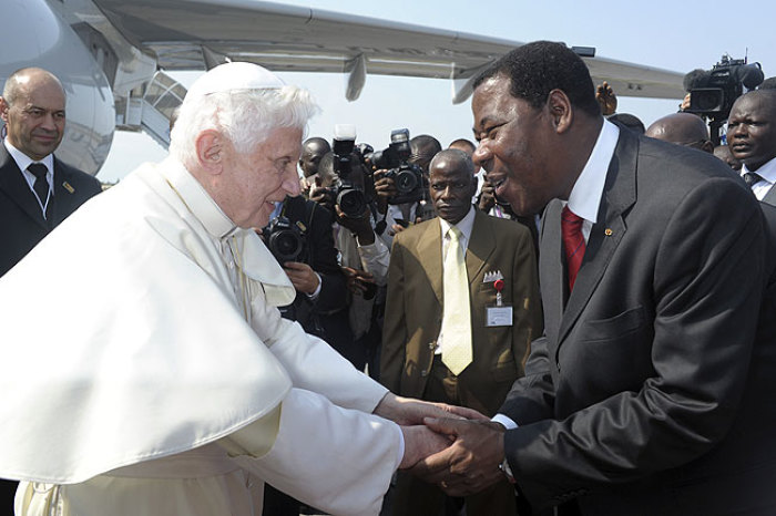 Pope Benedict XVI shakes hands with Benin's President Thomas Boni Yayi during a welcome ceremony at Cotonou airport in Benin on Nov. 18, 2011.