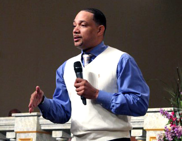 Zachery Tims is seen preaching in this photo published on New Destiny Christian Center's Facebook page.