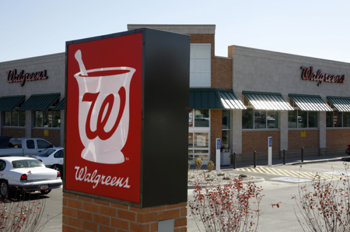 A customer drives away from the Walgreens in Westminster, Colorado October 30, 2008.