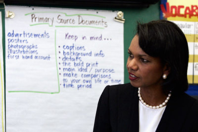 In this file photo, U.S. Secretary of State Condoleeza Rice visits a fifth grade class during a visit to the Harriet Tubman Charter School in New York October 1, 2007.