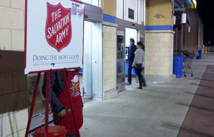 A Salvation Army red kettle is seen in front of a Walmart in Alexandria, Va., November 2011.