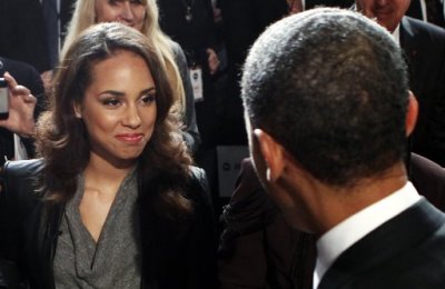 Singer Alicia Keys meets U.S. President Barack Obama after he delivered remarks at a World AIDS Day event at George Washington University in Washington December 1, 2011.